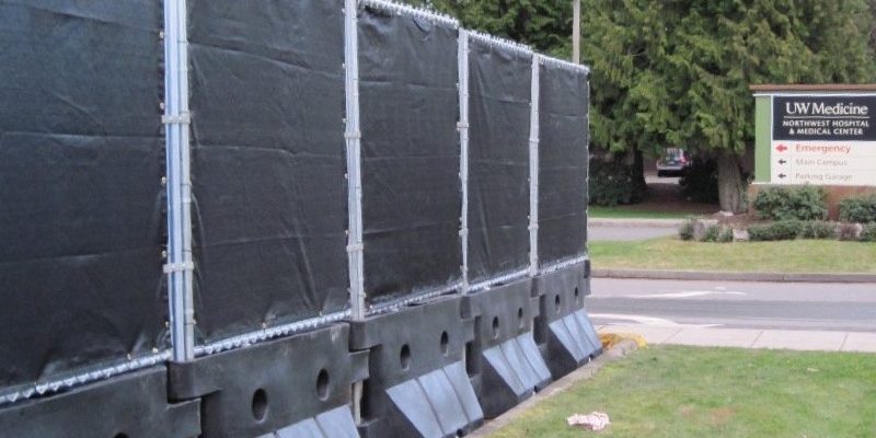 Watercade temporary fencing in front of construction project at hospital